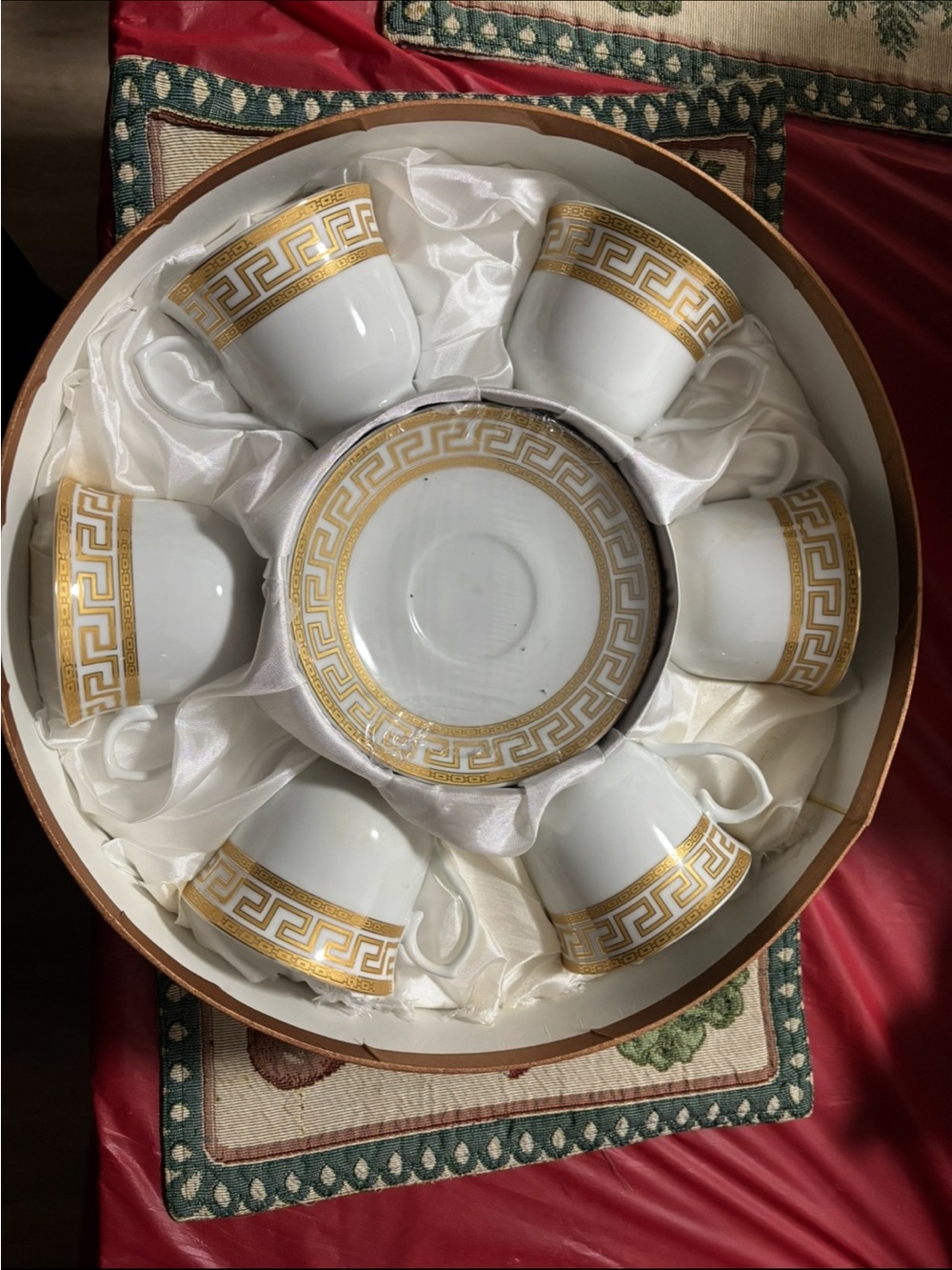 Elegant White Porcelain Tea Cup and Saucer Set with Gold Greek Key Trim